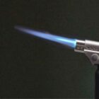 Image of a torch lighter being fired